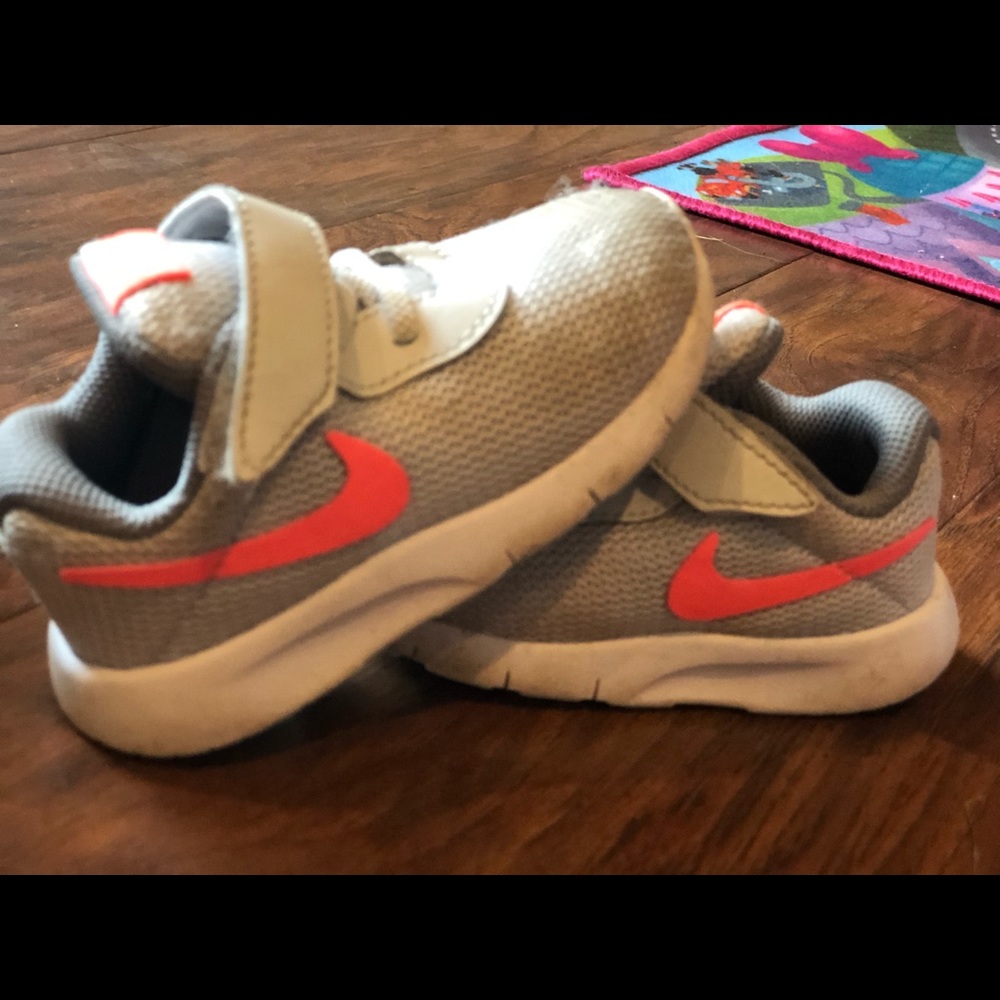 Grey and peach Nike sneakers